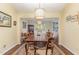 Formal dining room with hardwood floors and a large dining table at 8450 Perry Rd, Graham, NC 27253