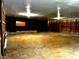 Spacious garage with shelving and storage at 8450 Perry Rd, Graham, NC 27253