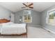 Spacious bedroom with wood flooring and a large window at 8450 Perry Rd, Graham, NC 27253