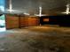 Garage with large wooden doors and ample space at 8450 Perry Rd, Graham, NC 27253