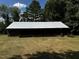 Metal-roofed garage with ample space at 8450 Perry Rd, Graham, NC 27253