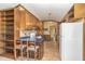 Galley-style kitchen with ample cabinetry and a breakfast bar at 8450 Perry Rd, Graham, NC 27253