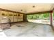 Covered carport with brick and concrete flooring at 8450 Perry Rd, Graham, NC 27253