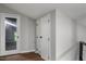 Upper hall with mirrored door and built-in storage at 1844 Brier Ln, Graham, NC 27253