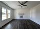 Living room with hardwood floors and a wood mantel at 223 Waterwheel Dr, Selma, NC 27576