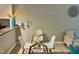 Bright dining area with glass table and white chairs, kitchen partially visible at 710 M.L.K. Jr Blvd # F4, Chapel Hill, NC 27514