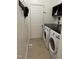 Convenient laundry room with washer, dryer, and extra storage at 970 Southern High School Rd, Graham, NC 27253