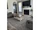 Spacious living room featuring a fireplace and ample seating at 970 Southern High School Rd, Graham, NC 27253