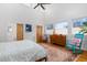 Spacious main bedroom with high ceilings, large windows, and a sitting area at 617 Tower St, Raleigh, NC 27607