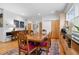 Elegant dining room featuring a wood table, rich colored chairs, and an area rug at 617 Tower St, Raleigh, NC 27607