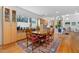 Dining area with wood table and chairs, adjacent to kitchen at 617 Tower St, Raleigh, NC 27607