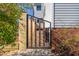 Stylish modern gate leading to the backyard at 617 Tower St, Raleigh, NC 27607