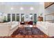 Bright living room with high ceilings, hardwood floors, and access to backyard at 617 Tower St, Raleigh, NC 27607