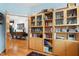 Home office with built-in shelving and views into the dining room at 617 Tower St, Raleigh, NC 27607