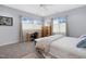 Bright bedroom featuring a built-in workspace and ample natural light at 617 Tower St, Raleigh, NC 27607