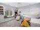 Cozy bedroom with built-in bookshelves and window seat at 617 Tower St, Raleigh, NC 27607