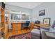 Home office with built-in shelving and comfortable seating at 617 Tower St, Raleigh, NC 27607