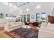 Spacious living room with high ceilings, hardwood floors, and ample natural light at 617 Tower St, Raleigh, NC 27607