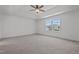 Bright bedroom with ceiling fan and large windows at 91 Walker Grove Ln, Lillington, NC 27546