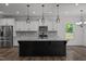 Modern kitchen with stainless steel appliances and granite countertops at 91 Walker Grove Ln, Lillington, NC 27546