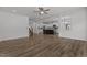 Spacious living room featuring hardwood floors and ceiling fan at 91 Walker Grove Ln, Lillington, NC 27546