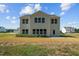 House exterior showcasing the back of the house and patio at 91 Walker Grove Ln, Lillington, NC 27546