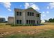 House exterior showcasing the back of the house and patio at 91 Walker Grove Ln, Lillington, NC 27546