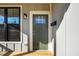 Modern front door with black frame and glass panels at 531 Booth St, Roxboro, NC 27573