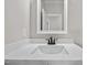 Simple bathroom with white vanity, sink, and a mirror at 531 Booth St, Roxboro, NC 27573