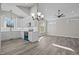 Modern kitchen with white cabinets, stainless steel appliances, and quartz countertops at 531 Booth St, Roxboro, NC 27573