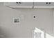 Laundry room with hookups and built-in cabinets at 531 Booth St, Roxboro, NC 27573