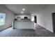 Open kitchen features granite countertops and modern appliances at 32 Scotties Ridge Dr, Princeton, NC 27569