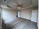 Bright main bedroom with ceiling fan and carpet flooring at 32 Scotties Ridge Dr, Princeton, NC 27569