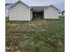 House exterior view with covered patio and grassy yard at 32 Scotties Ridge Dr, Princeton, NC 27569