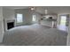 Spacious living room with a fireplace and high ceilings at 32 Scotties Ridge Dr, Princeton, NC 27569