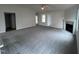 Open living room with fireplace and ample natural light at 32 Scotties Ridge Dr, Princeton, NC 27569