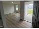 Living room with light flooring and access to front porch at 32 Scotties Ridge Dr, Princeton, NC 27569