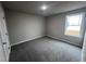 Spacious bedroom with neutral walls and carpet flooring at 58 Scotties Ridge Dr, Princeton, NC 27569