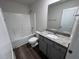 Bathroom with granite vanity and tub/shower combo at 72 Scotties Ridge Dr, Princeton, NC 27569