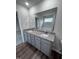 Bathroom vanity with granite countertop and double sinks at 72 Scotties Ridge Dr, Princeton, NC 27569