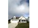 Newly built two-story home with white siding and a two-car garage at 72 Scotties Ridge Dr, Princeton, NC 27569