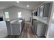 Modern kitchen with granite countertops and gray cabinets at 72 Scotties Ridge Dr, Princeton, NC 27569