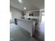 Modern kitchen featuring granite countertops and gray cabinets at 72 Scotties Ridge Dr, Princeton, NC 27569