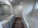 Double vanity bathroom with granite countertop at 72 Scotties Ridge Dr, Princeton, NC 27569