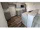 Modern kitchen with granite countertops and gray cabinets at 72 Scotties Ridge Dr, Princeton, NC 27569