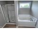 Bathroom with shower and bathtub at 158 Scotties Ridge Dr, Princeton, NC 27569
