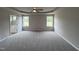 Main bedroom with two windows and access to bathroom at 158 Scotties Ridge Dr, Princeton, NC 27569