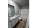 Bathroom with single vanity, granite countertop, and bathtub at 158 Scotties Ridge Dr, Princeton, NC 27569