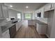 Modern kitchen with granite countertops and white cabinets at 158 Scotties Ridge Dr, Princeton, NC 27569