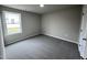 Bright bedroom with carpet flooring and a window at 158 Scotties Ridge Dr, Princeton, NC 27569